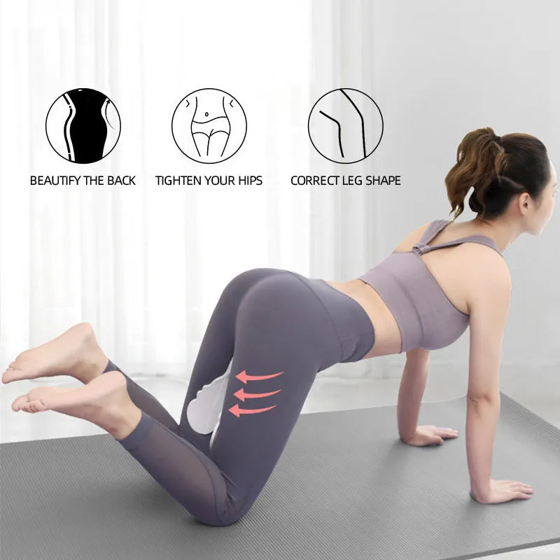Pink hip trainer with silicone surface measuring 27cm by 9.5cm for pelvic floor and inner thigh exercises