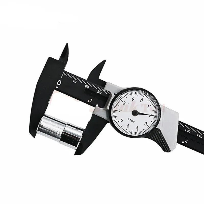 Black and white plastic vernier caliper showing 0-150mm measurement scale with 0.1mm resolution