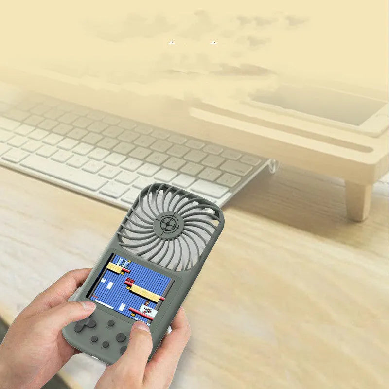 Mini handheld games console with built-in fan, 2.8-inch screen, and 500 classic games, in Dark Green
