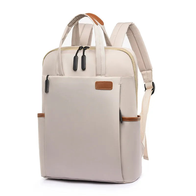 15.6-inch canvas computer backpack in black with waterproof finish and multiple internal compartments