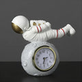 Resin astronaut desktop clock decoration in gold finish for children's bedroom bookcase