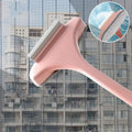 Blue and pink screen cleaning brush with double-sided head and separate gap cleaning tool on a white background.