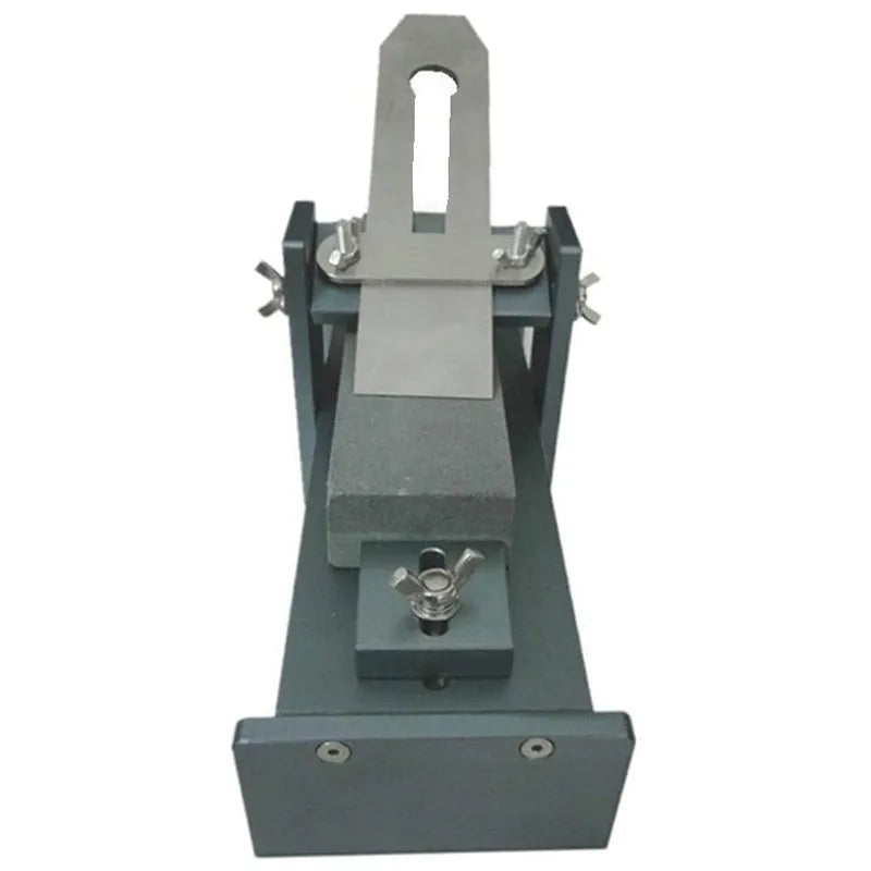 Fixed angle sharpening gantry tool made of aluminium alloy and stainless steel for sharpening woodworking chisels and planer blades.