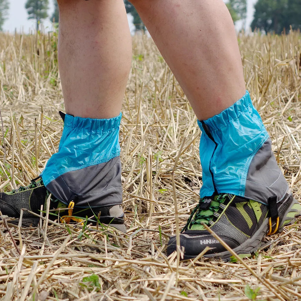 Splash-proof nylon foot cover in black on a rocky trail background, 22cm by 20cm unisex gaiter.