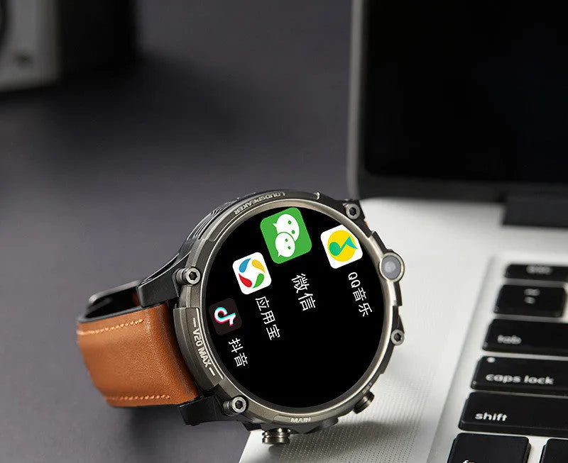 Black smart phone watch with 1.6-inch screen on a wrist strap, showing 4G, dual camera, and heart rate features.