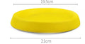 Yellow EVA plastic throwing disc dog training toy on grass