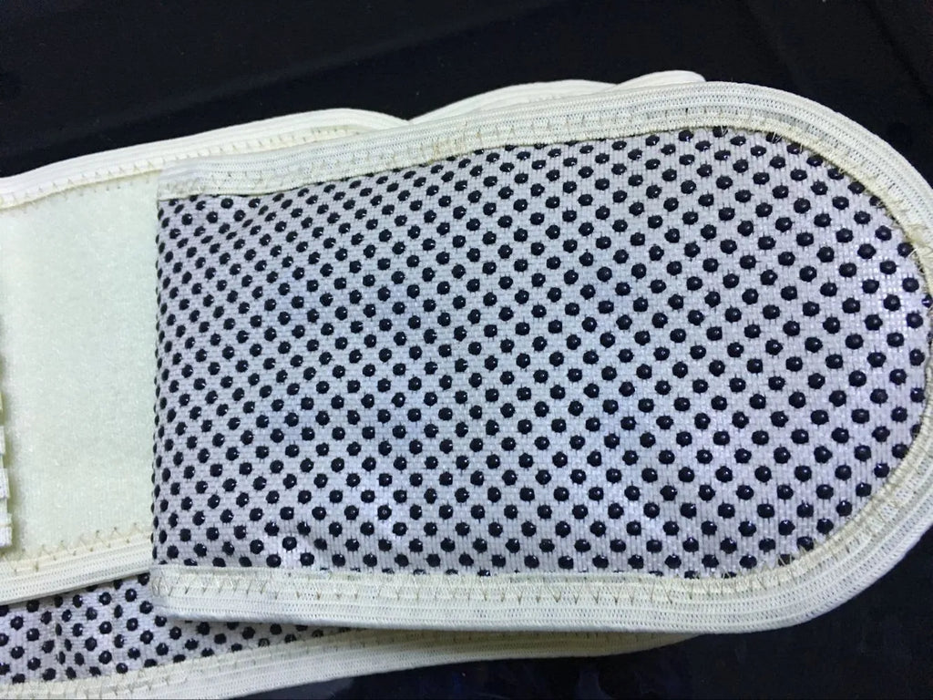 Self-heating magnetic waist protection belt in elastic cloth material showing black and beige colour options