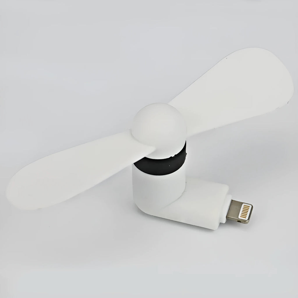 White mobile phone mini fan attached to smartphone showing plastic blades and rotary switch