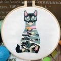 Cross stitch embroidery kit with three-dimensional cat design on cotton fabric with embroidery stretcher