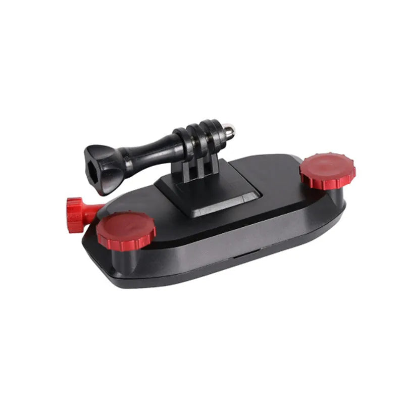 Blue plastic shoulder strap buckle clip for mounting a sports camera to a backpack.