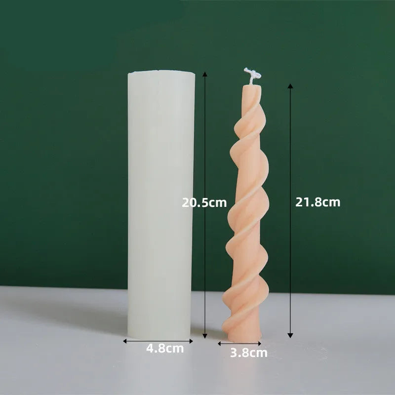 Flexible silicone mould for creating spiral lace rod shaped decorative candles.