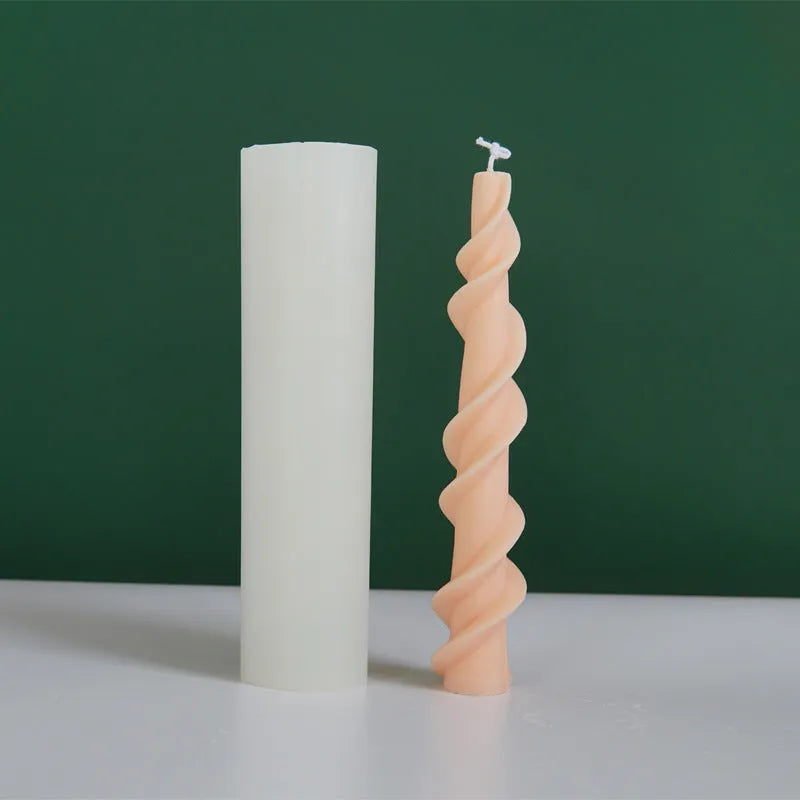 Flexible silicone mould for creating spiral lace rod shaped decorative candles.