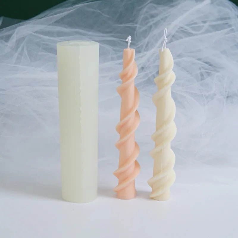 Flexible silicone mould for creating spiral lace rod shaped decorative candles.
