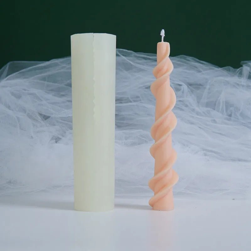 Flexible silicone mould for creating spiral lace rod shaped decorative candles.