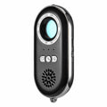 Compact black rectangular wireless signal detector with vibration alarm for security and pinhole camera detection.