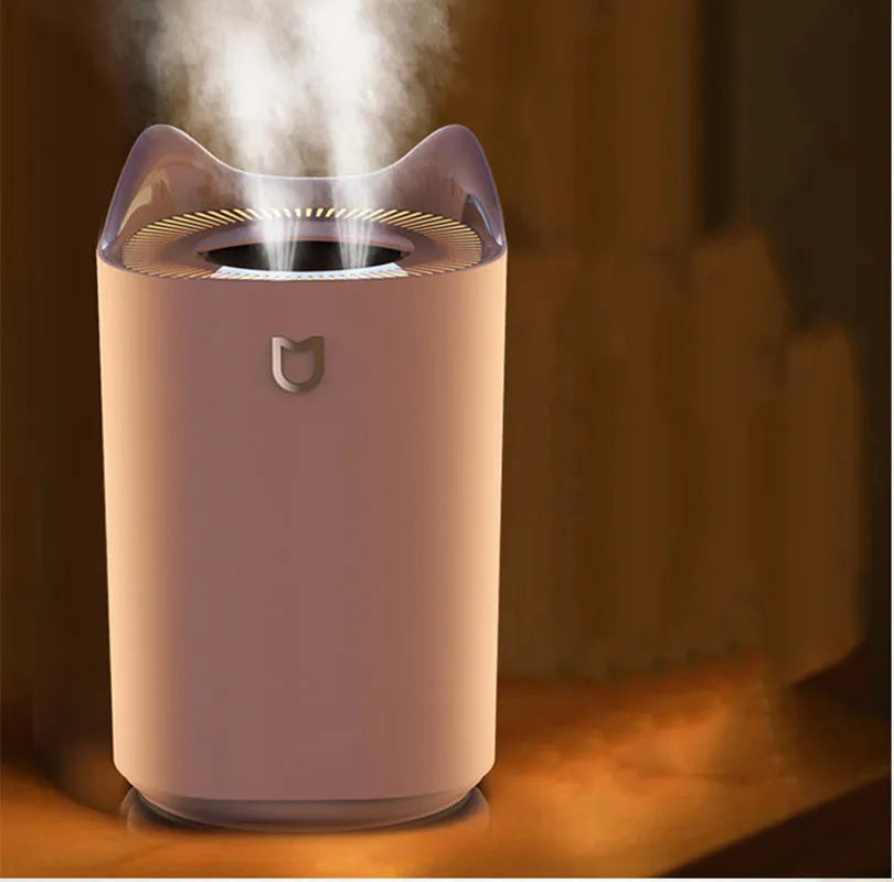Double spray USB humidifier with large water tank in coral pink or white colour