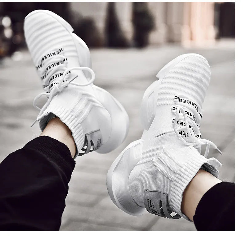 Men's black and white casual sports shoes with mesh lining available in sizes 39 to 47