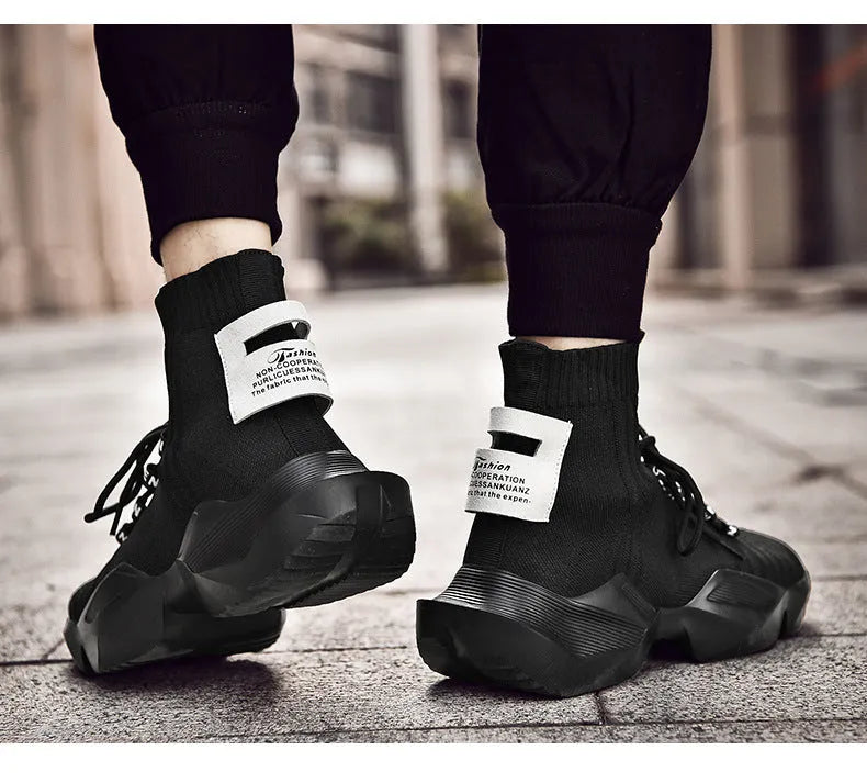 Men's black and white casual sports shoes with mesh lining available in sizes 39 to 47