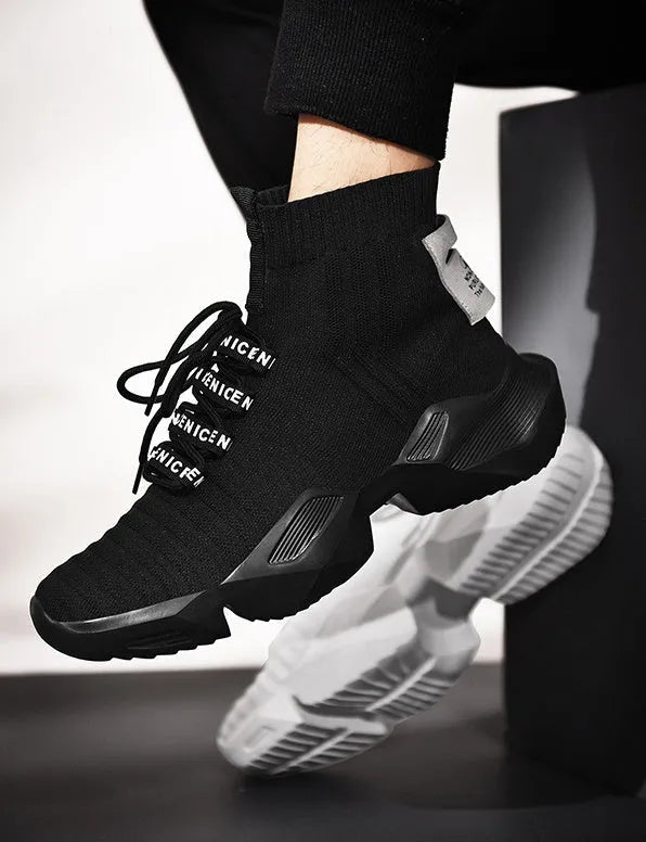 Men's black and white casual sports shoes with mesh lining available in sizes 39 to 47