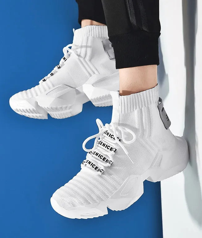 Men's black and white casual sports shoes with mesh lining available in sizes 39 to 47
