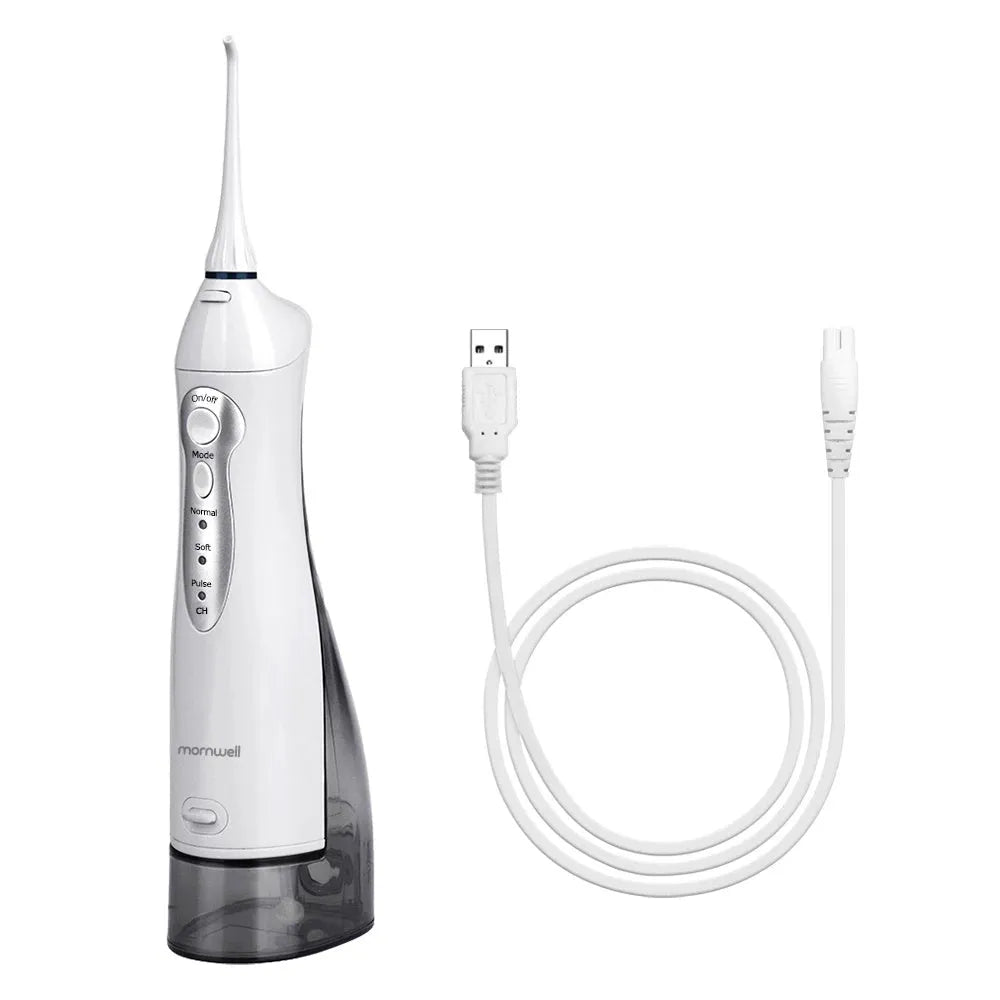 Electric oral irrigator with 330ml water tank, USB charging, and three cleaning modes on a bathroom counter