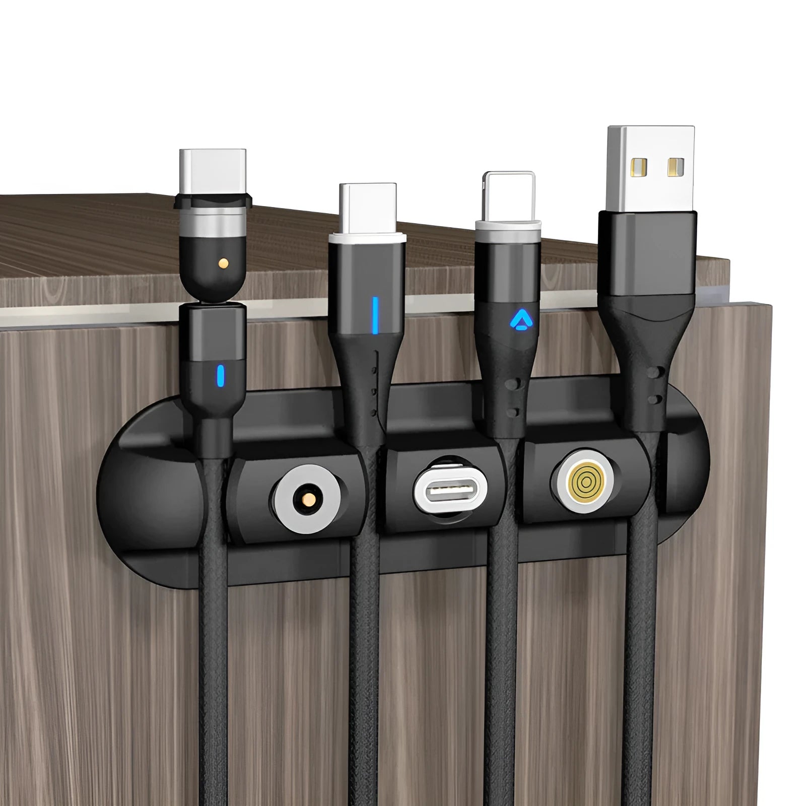 Black soft plastic desktop magnetic charging cable organiser on desk