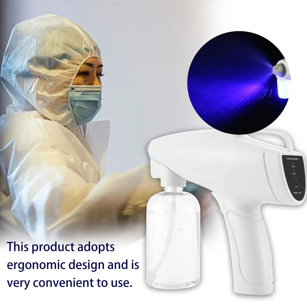 White handheld cordless electric spray disinfection gun with USB charging cable.