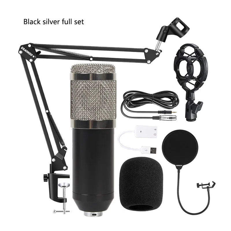 BM800 condenser microphone kit with V8 sound card, shock mount, pop filter, and cantilever arm on a desk