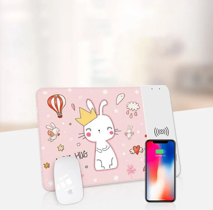 Colourful cartoon wireless charging mouse pad with RGB lighting, showing non-slip rubber base and cloth surface.