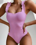 One piece swimsuit with ruffle detail and chest pad, solid colour, sizes S-XXL