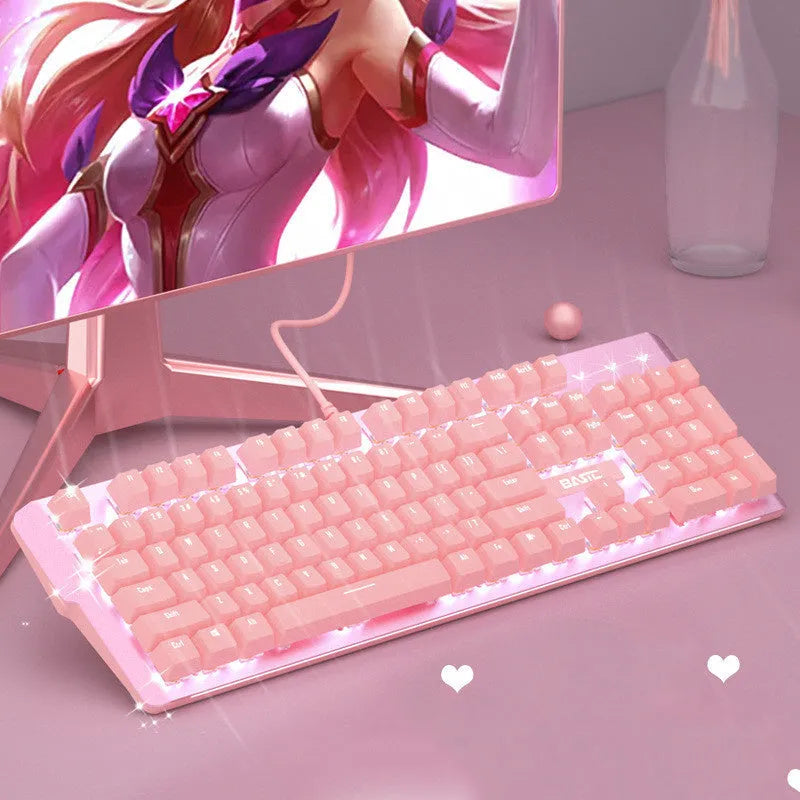 Pink mechanical gaming keyboard and wired mouse set on desk with USB cables