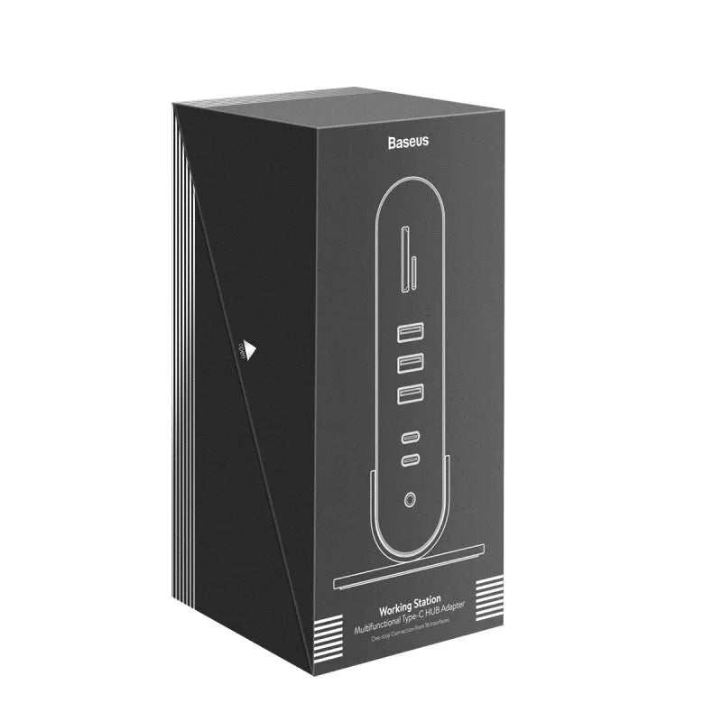 Deep space grey 16-in-1 USB-C docking station with external power supply on desktop