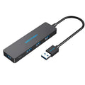 Black four-port USB 3.0 hub with a short cable and nickel-plated connectors