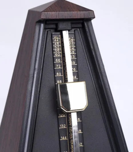 Mechanical tower metronome with imitation wood grain finish, PPS plastic body, 800g weight