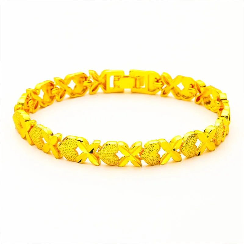 Sand gold four-leaf clover heart bracelet in brass with electroplated textured finish