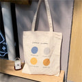 Women's canvas tote shopper bag with geometric print pattern and zip closure in light pink colour