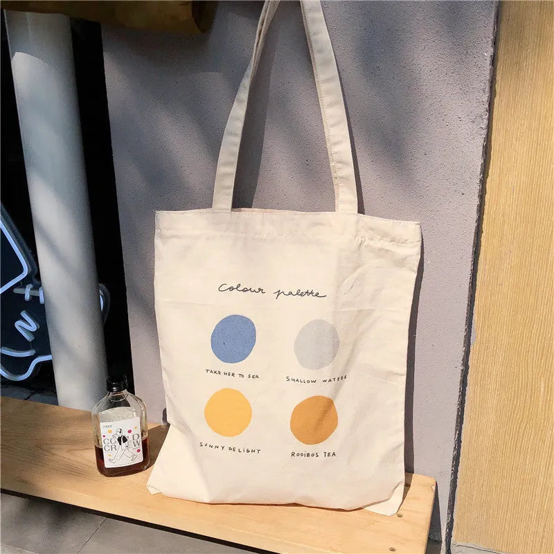 Women's canvas tote shopper bag with geometric print pattern and zip closure in light pink colour