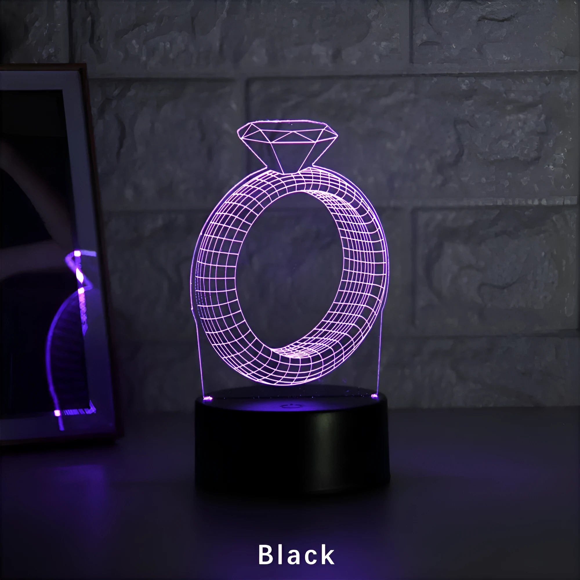 3D diamond ring LED night light with colour-changing LEDs in an acrylic and ABS plastic housing.