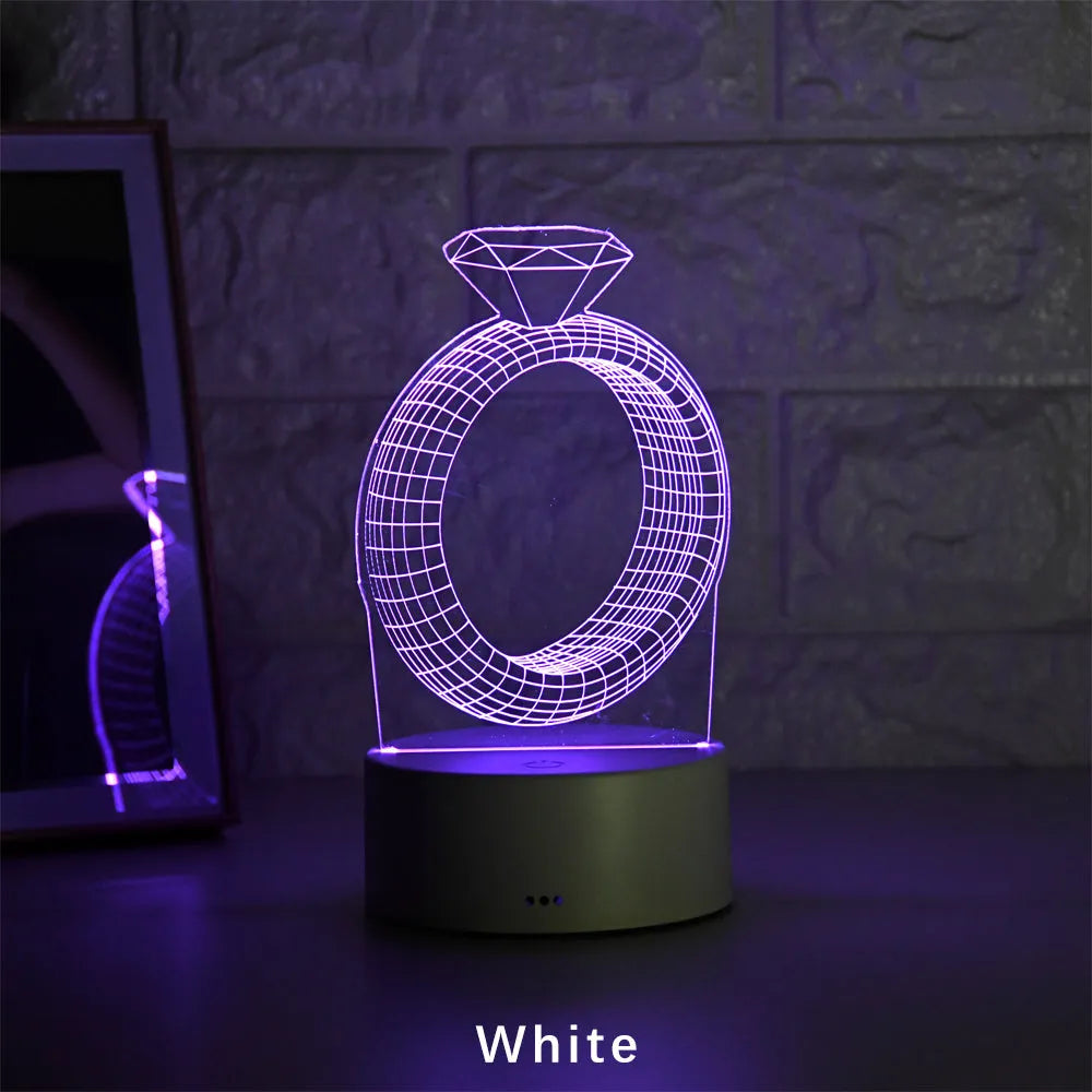 3D diamond ring LED night light with colour-changing LEDs in an acrylic and ABS plastic housing.