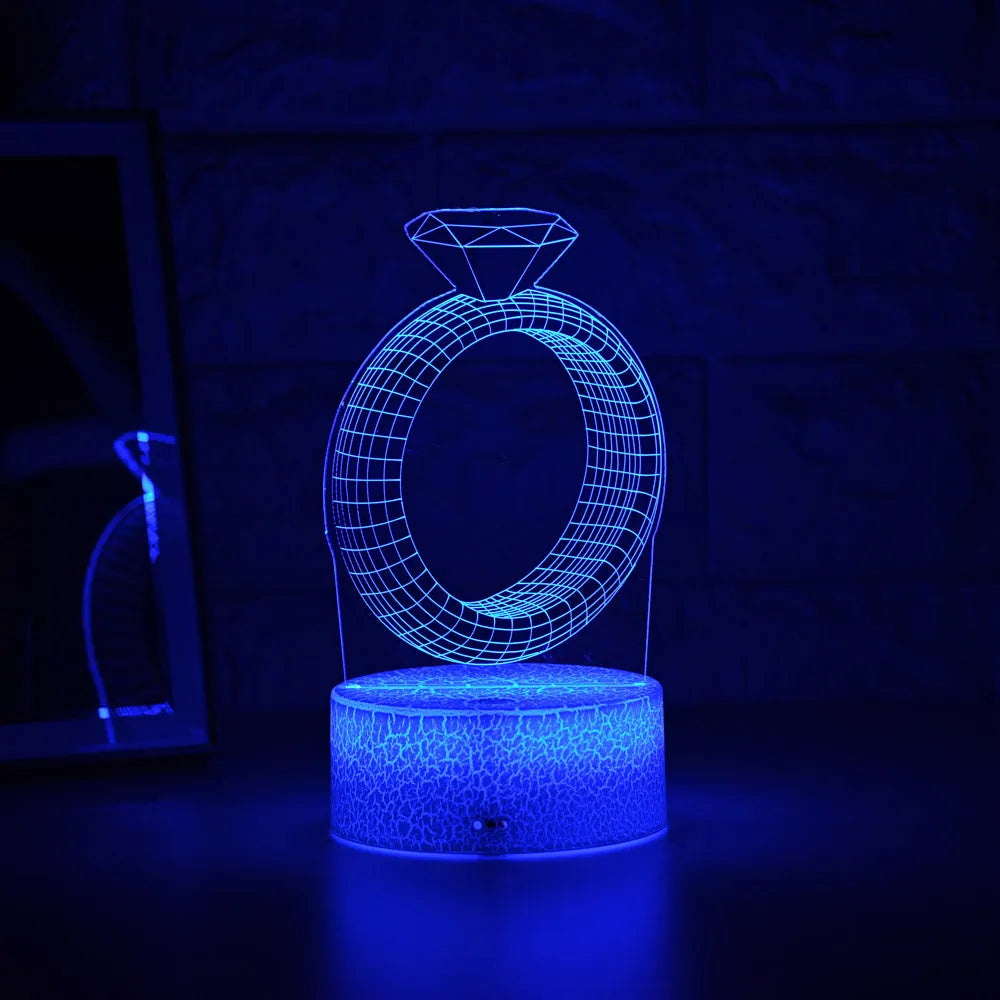 3D diamond ring LED night light with colour-changing LEDs in an acrylic and ABS plastic housing.
