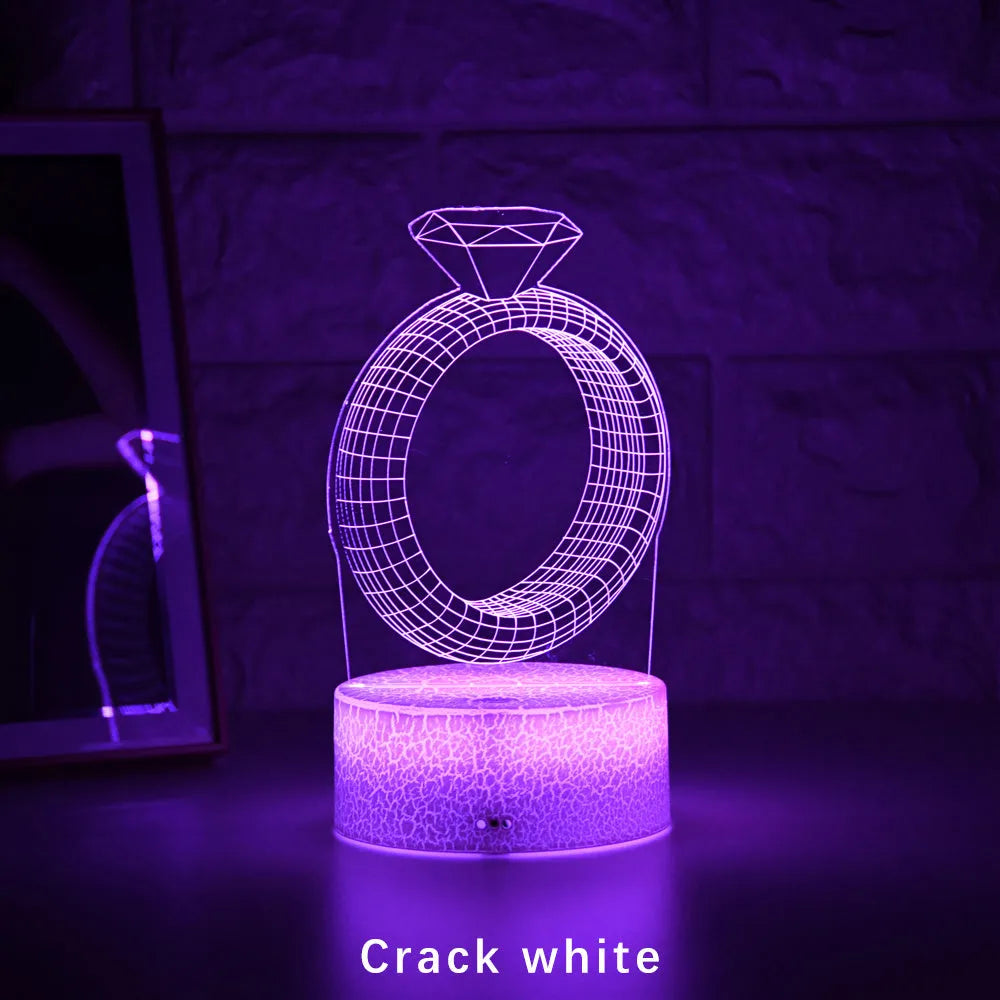 3D diamond ring LED night light with colour-changing LEDs in an acrylic and ABS plastic housing.