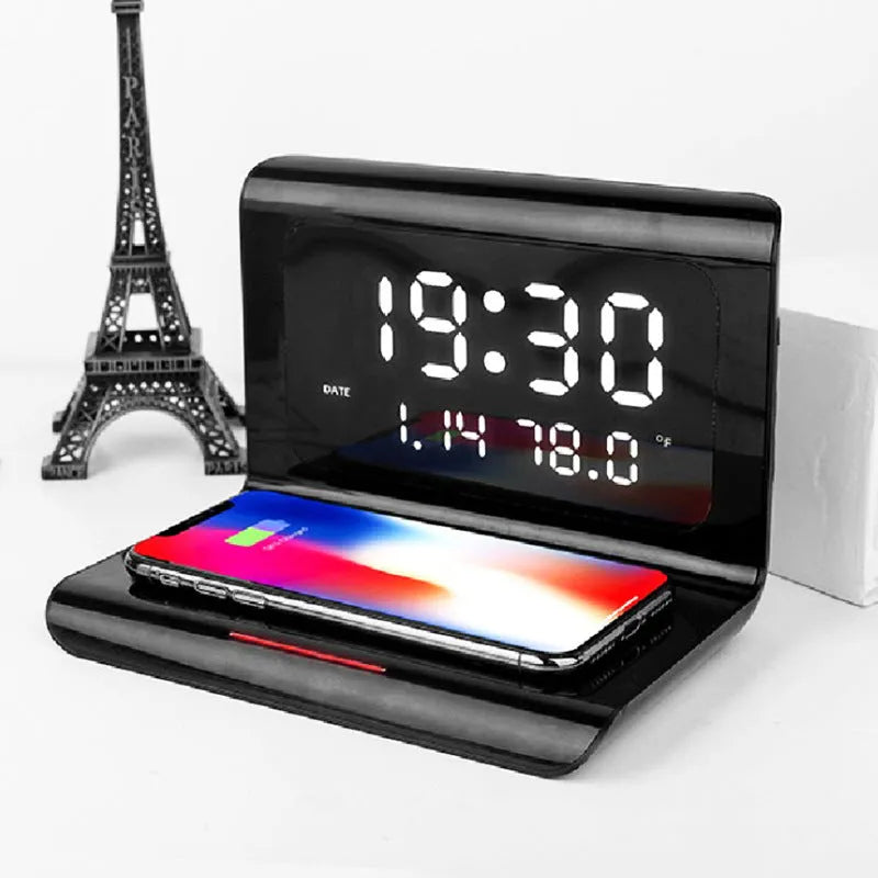 White wireless charger alarm clock showing time, date, and temperature on digital display
