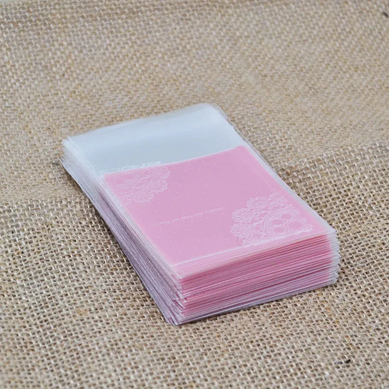 Pink self-adhesive plastic packaging bags with resealable zip for handmade soap