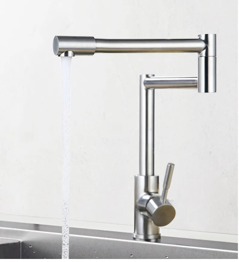 Silver stainless steel kitchen tap with rotating spout showing 360-degree movement capability