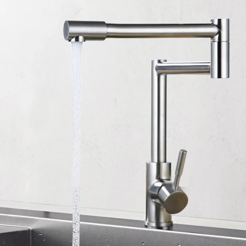 Silver stainless steel kitchen tap with rotating spout showing 360-degree movement capability