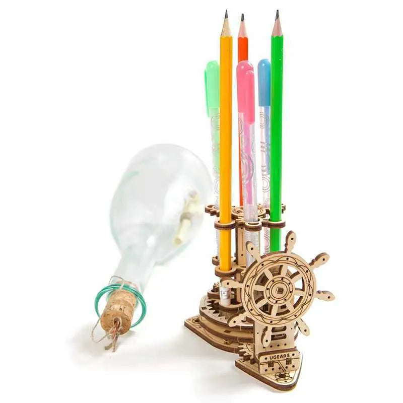 Ukrainian wooden rotating pen holder with steering wheel mechanism on desk