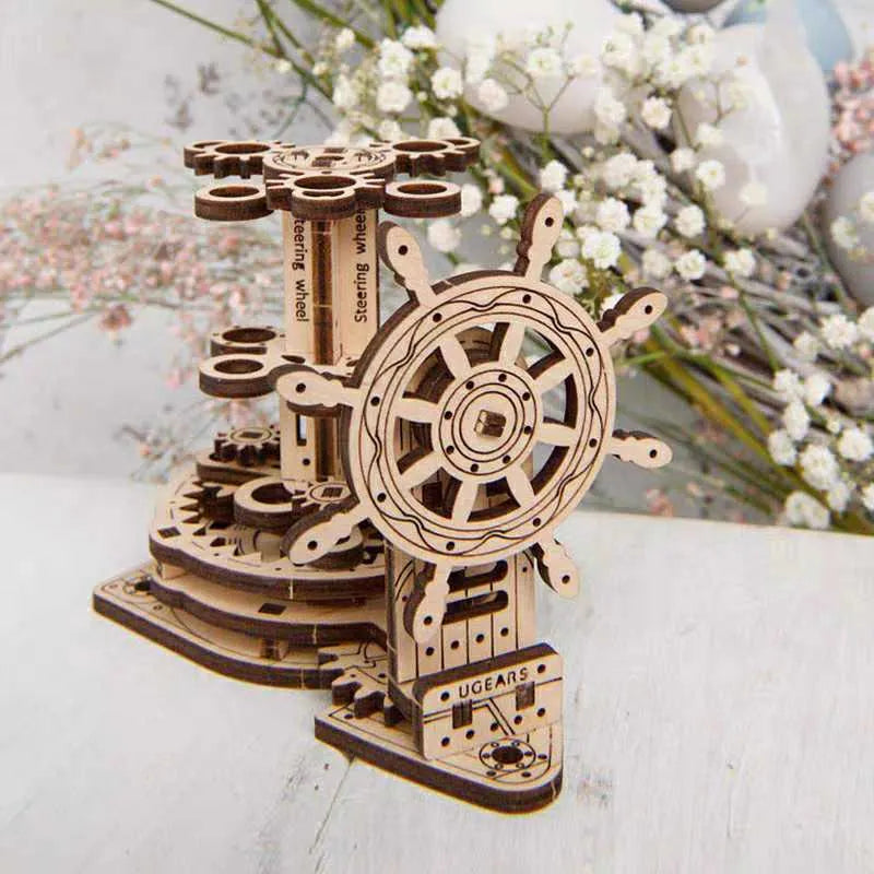 Ukrainian wooden rotating pen holder with steering wheel mechanism on desk