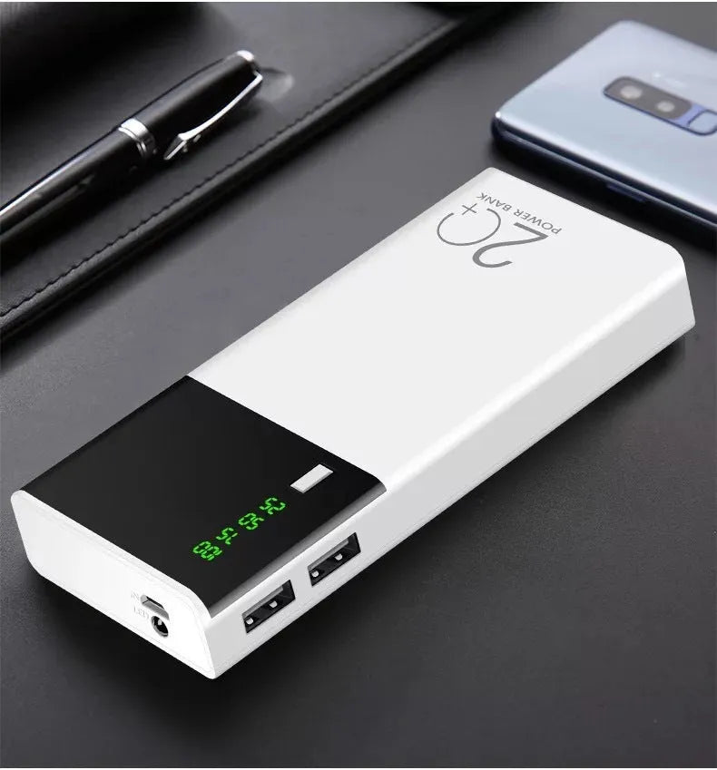 Black 20000mAh power bank with charging cable on a white background