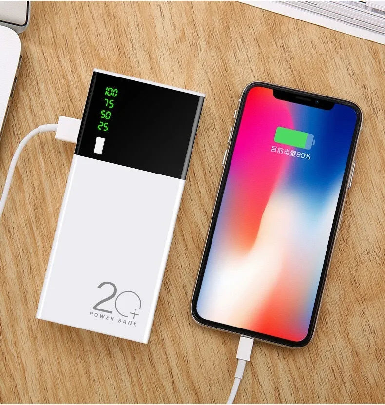 Black 20000mAh power bank with charging cable on a white background