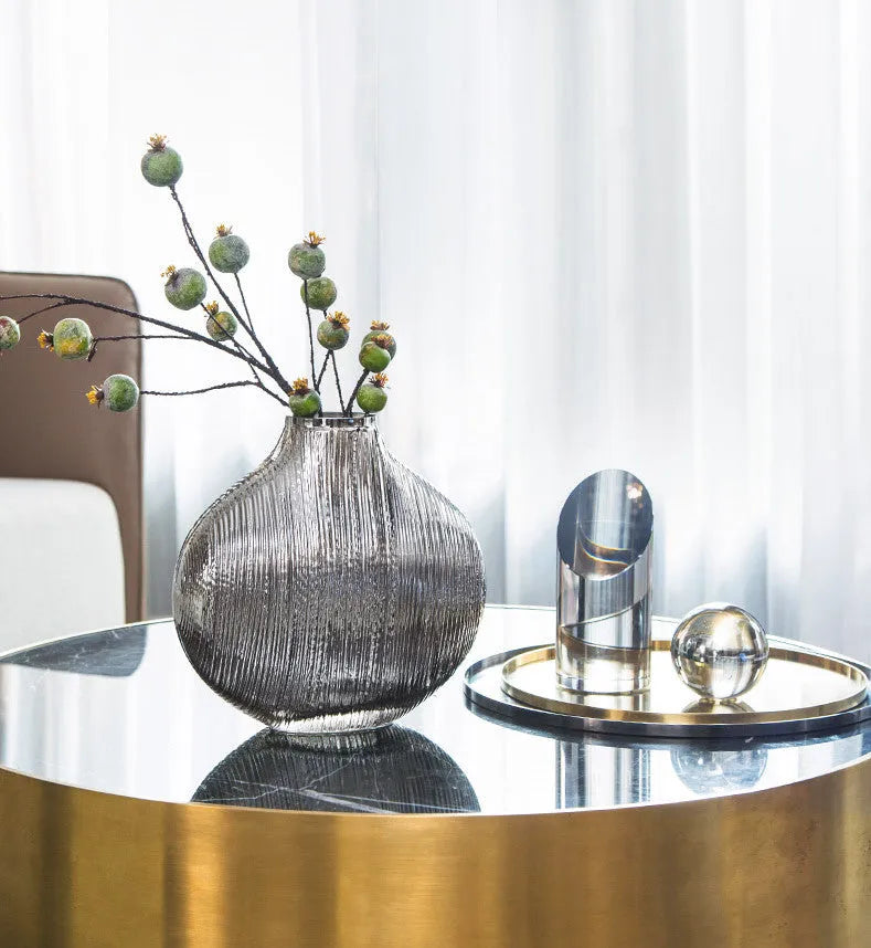 Silver brushed electroplated glass vase L size 25x13x25cm with striped finish on table